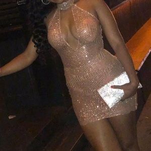 bedazzled sheer dress, with a solid back.